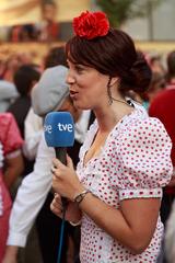 Sandra Muñoz Guerrero in chulapa attire during Virgen de la Paloma festival in Madrid