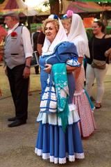 A chulapa in traditional attire at Las Vistillas during Virgen de la Paloma Festival in Madrid