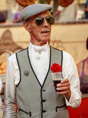 A chulapo dressed in traditional attire during Fiestas de la Virgen de la Paloma in Madrid