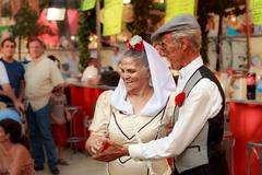 Chulapos dancing chotis during Fiestas de la Paloma in Madrid