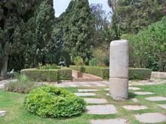 Ancient Roman column in Puerta Oscura Gardens, Málaga, Spain