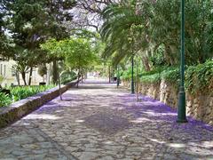 flower-covered pathway in Gardens of Puerta Oscura