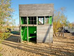 Baakenpark playground in Hamburg with wooden houses designed by children