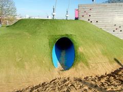 Baakenpark playground tunnel and climbing wall for children in Hamburg