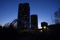 Moonlit Bridge at night with reflections on the water