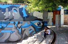 Mural by Gabriel Maulen on the facade of La Chascona in Santiago, Chile