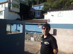 Edinaldo E. Santo in front of Pablo Neruda's house in Santiago