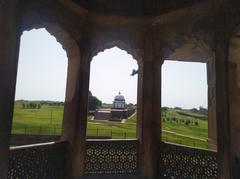 View of Raja Harsh ka Tila site through a terrace tomb