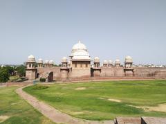 View of tomb through site at Raja Harsh ka Tila