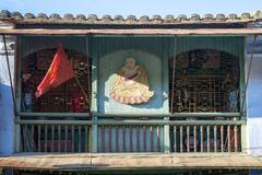 Scenic view of Hoi An with traditional yellow buildings lining the river