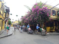 Tourists transported on bicycles in Hoi An, Vietnam