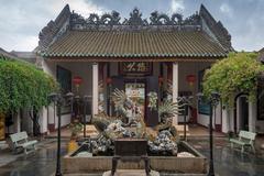 Hoi An ancient town streets at dusk with colorful lanterns and traditional architecture