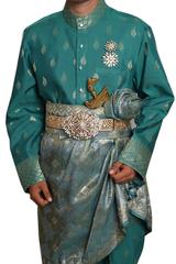 Traditional Malay groom attire with leaf patterns