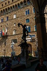 View of Palazzo Vecchio, Michelangelo's David, and Perseus with the Head of Medusa in Loggia dei Lanzi, Florence