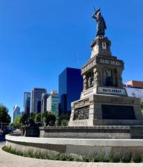 Monument of Cuitlahuac surrounded by greenery in a public park