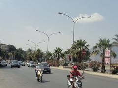 Foro Italico traffic in Palermo, Sicily, with Monte Pellegrino in the background