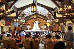 Hong Kong Disneyland entrance with welcome signs in multiple languages