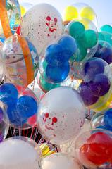 Colorful Disney helium balloons flying at Disneyland