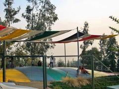 Children playing on an inflatable game at Parque Mahuida, La Reina, Santiago, 2009