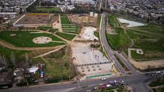 Parque Peñalolén on a sunny day with green fields and trees