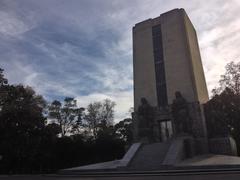 Panoramic view of Parque la Bombilla with lush greenery and walking paths