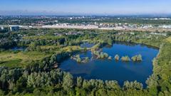 View of LSG Nordfriedhof and Ginsterpfad area with abundant green landscape taken by a drone