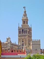 Giralda tower in Seville under blue sky