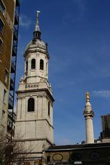 High in the sky view of London with St. Magnus the Martyr tower in the foreground and The Monument in the background