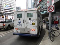 Armoured car for cash deliveries at 10 Dundas Street East