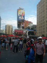 Canada Day celebration at Dundas Square, crowd of people enjoying festivities