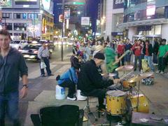 Drummers performing at Yonge-Dundas Square, Toronto