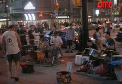 Drummers performing at Yonge and Dundas in Toronto