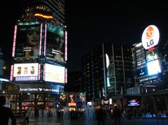 Toronto Yonge and Dundas Square bustling with people and advertisements