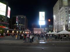 Dundas Square in Toronto with buildings, billboards, and people