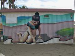 Lalo Luque mural on Misericordia Beach, Málaga, Spain