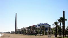 Two chimneys in Málaga on the Paseo Marítimo Antonio Banderas