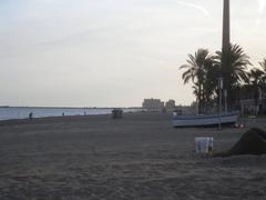 Coastal view of Pacífico, Málaga with clear blue sky and calm sea