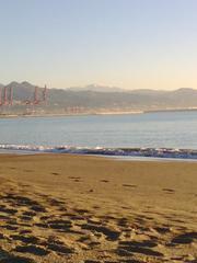 morning footsteps on Playa de la Misericordia in Málaga