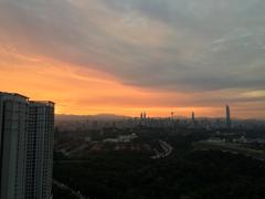 Sunrise in Kuala Lumpur with Petronas Tower and PNB 118