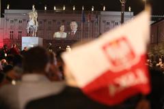 Tribute to President Lech Kaczyński and First Lady Maria Kaczyńska on the facade of the Presidential Palace in Warsaw on the anniversary of the Smolensk tragedy.