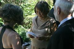 wedding guest reading informational sheet at J. C. Raulston Arboretum