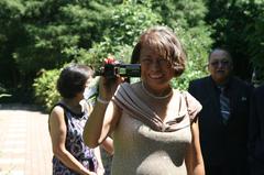 wedding guest using a digital camcorder at J. C. Raulston Arboretum