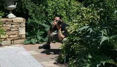 Photographer taking a picture at a wedding at the J. C. Raulston Arboretum in Raleigh, North Carolina