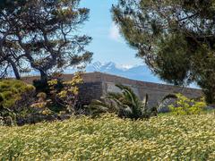 Scenic coastline of Crete with clear blue waters and mountainous background