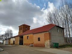 Torre de los Molinos parish church facade under blue sky