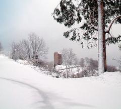 Torreón de Peñerudes with snow viewed from the church