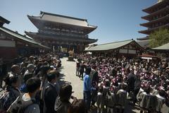 children waiting at Sensō-ji temple square during Buddha's birthday celebration