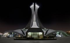 Montreal Olympic Stadium at night from the back