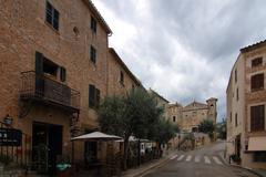 Banyalbufar street view with stone houses and greenery