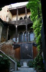 Entrance and courtyard of Palazzo Fortuny in Venice, Italy